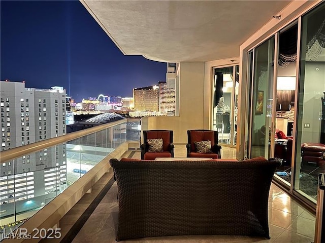 balcony at night with a view of city lights