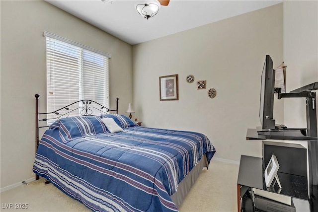 bedroom with carpet floors and baseboards