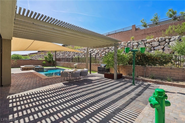 view of patio with a pool with connected hot tub, a fenced backyard, and a grill