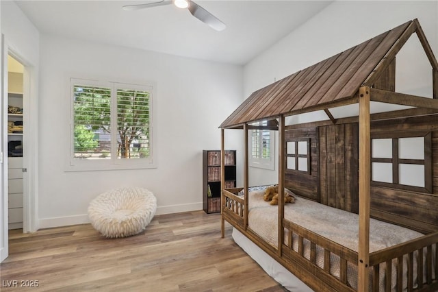 interior space with light wood-style floors and baseboards