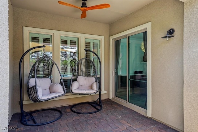 view of patio / terrace featuring a ceiling fan