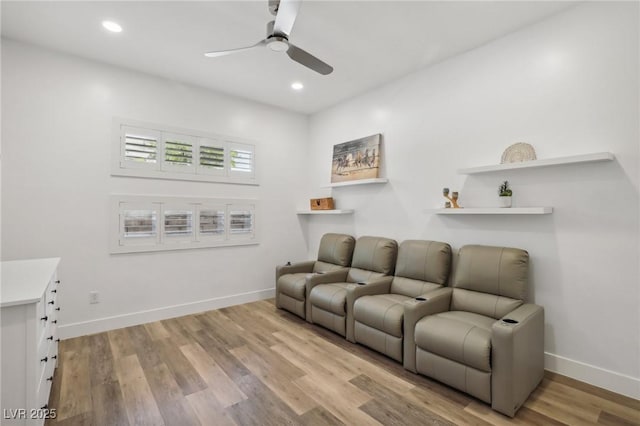 living area featuring ceiling fan, recessed lighting, wood finished floors, and baseboards