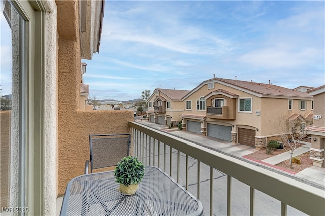 balcony featuring a residential view