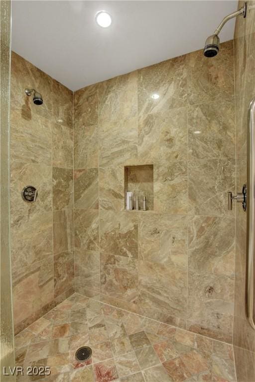 full bath featuring a shower stall