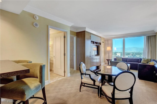 dining area with light colored carpet