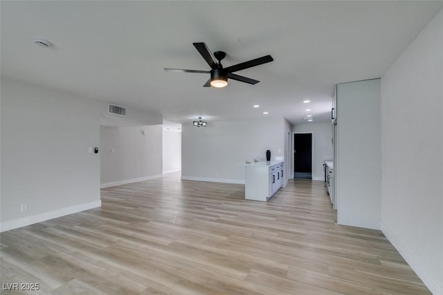 unfurnished room featuring light wood-style flooring, recessed lighting, visible vents, and ceiling fan