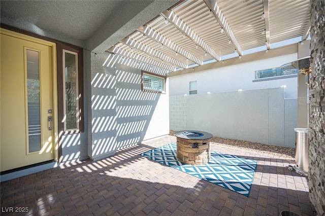 view of patio / terrace with fence and a pergola