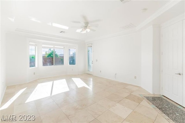 unfurnished room featuring ornamental molding, light tile patterned flooring, visible vents, and a ceiling fan