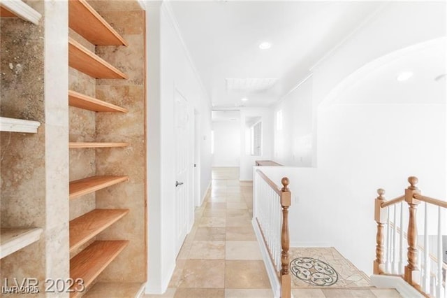 corridor with light tile patterned flooring and recessed lighting