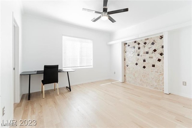 office with baseboards, a ceiling fan, and wood finished floors