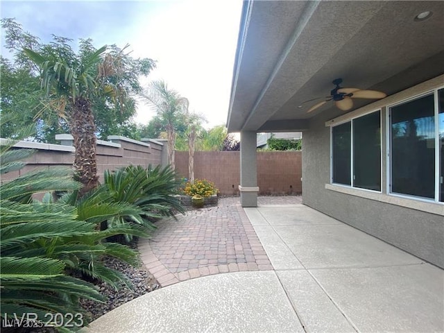 view of patio / terrace with ceiling fan and a fenced backyard