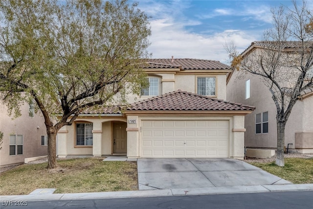 mediterranean / spanish home featuring stucco siding, concrete driveway, an attached garage, and a tile roof