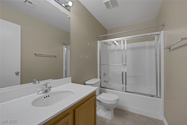 full bath featuring visible vents, toilet, vanity, and tile patterned flooring