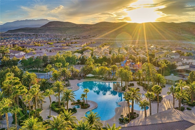 aerial view with a mountain view and a residential view