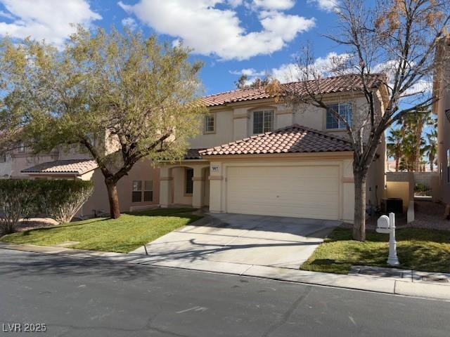 mediterranean / spanish-style home featuring a tiled roof, concrete driveway, a front yard, stucco siding, and a garage