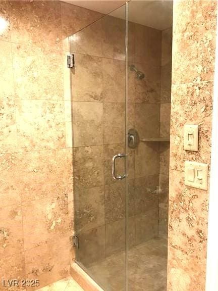 full bath featuring a stall shower