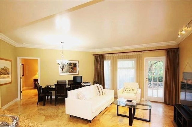 living room featuring a chandelier, baseboards, and crown molding