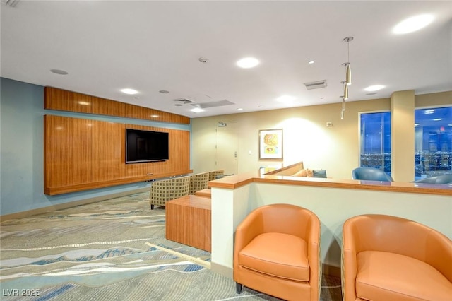 bar with visible vents, recessed lighting, and light colored carpet