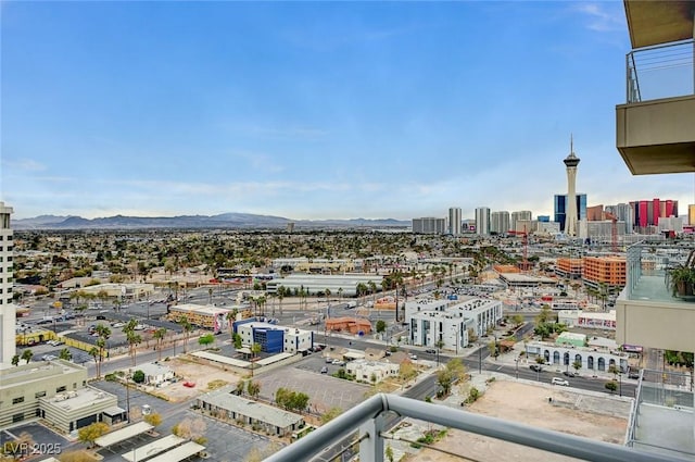 property's view of city with a mountain view