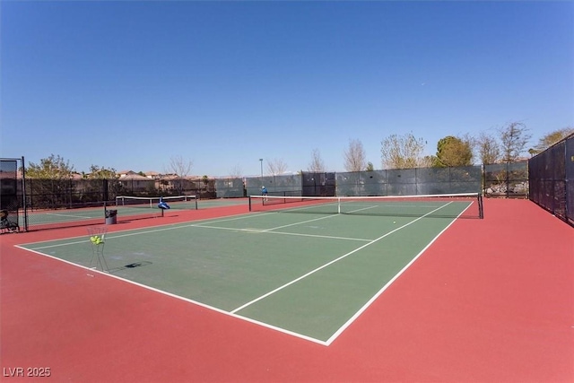 view of sport court featuring community basketball court and fence