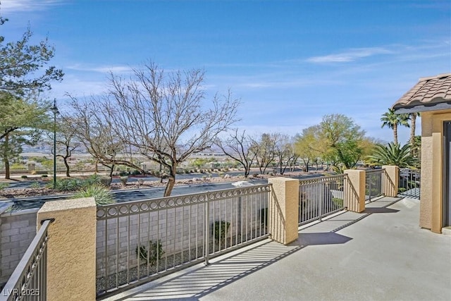 view of patio / terrace featuring a balcony