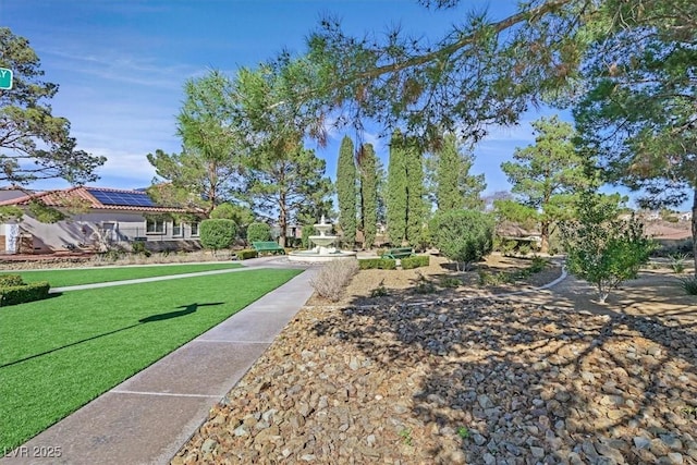 surrounding community with a lawn