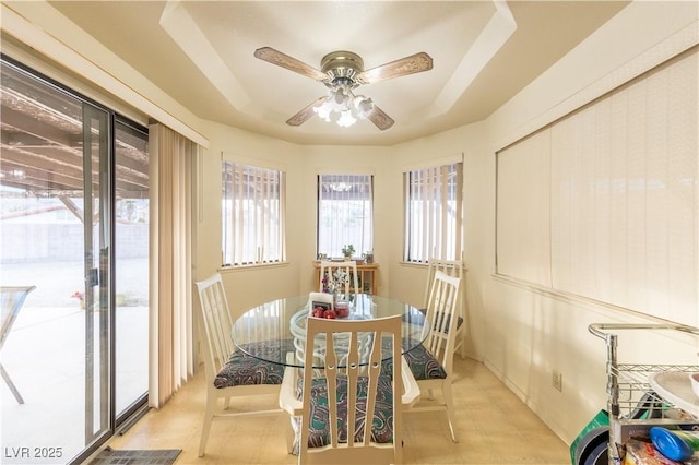 1892 Maricopa Dr, Laughlin, NV 89029 - dining room featuring ceiling fan and a tray ceiling