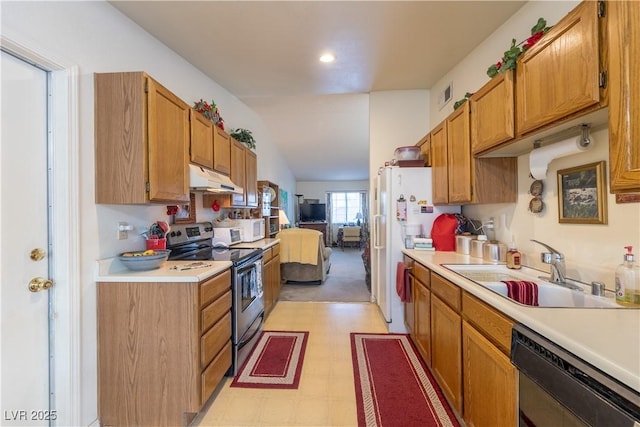 1892 Maricopa Dr, Laughlin, NV 89029 - kitchen featuring white appliances, light countertops, a sink, and under cabinet range hood