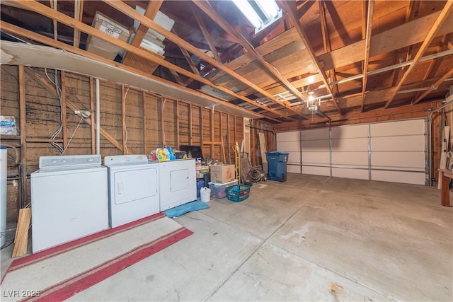 1892 Maricopa Dr, Laughlin, NV 89029 - garage with a garage door opener and washing machine and clothes dryer