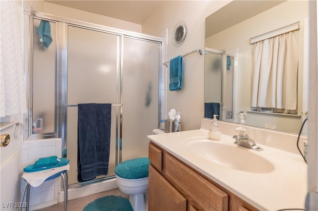 1892 Maricopa Dr, Laughlin, NV 89029 - full bath with vanity, a shower stall, and toilet