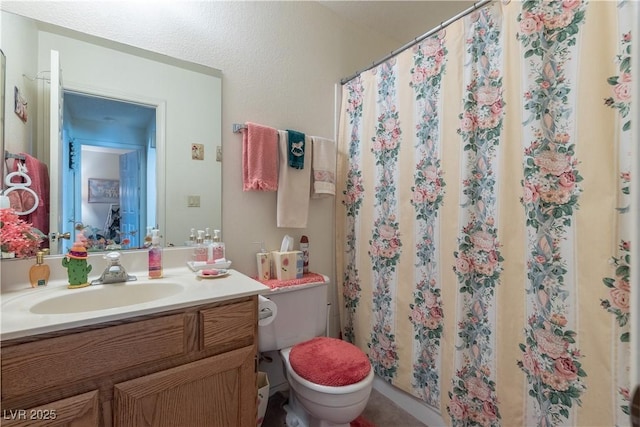 1892 Maricopa Dr, Laughlin, NV 89029 - full bath with a shower with curtain, vanity, and toilet