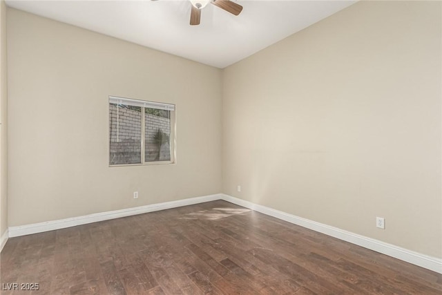 unfurnished room with a ceiling fan, baseboards, and wood finished floors