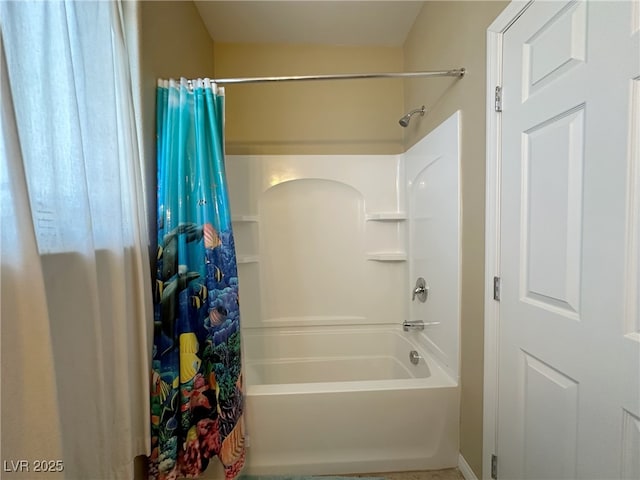 bathroom featuring shower / bath combo