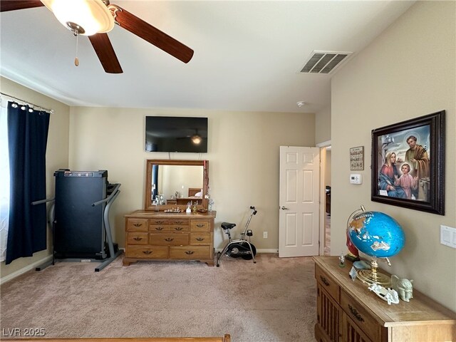 bedroom featuring baseboards, carpet, visible vents, and a ceiling fan