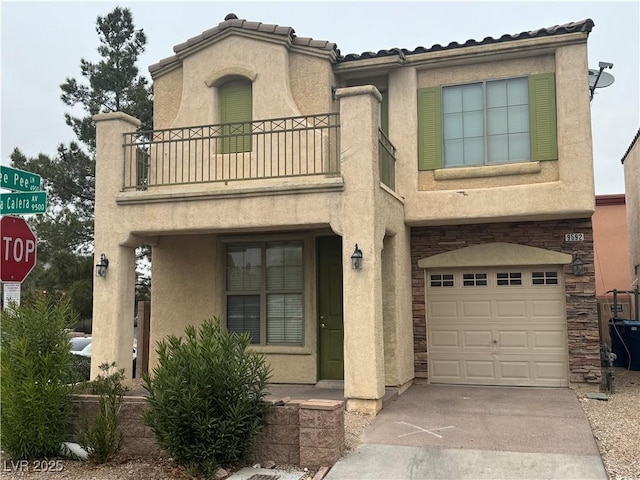 view of front facade featuring stucco siding, an attached garage, concrete driveway, and a balcony