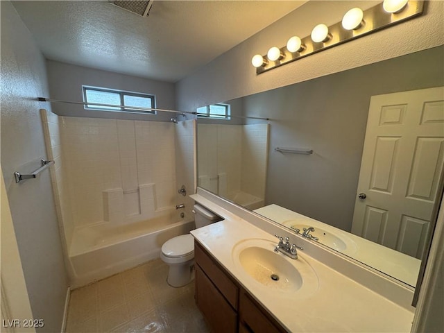 full bathroom featuring visible vents, toilet, vanity, shower / bathtub combination, and a textured ceiling