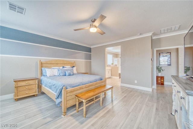 bedroom with baseboards, visible vents, and light wood-style floors