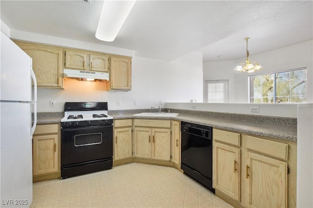 kitchen with range with gas stovetop, dishwasher, freestanding refrigerator, under cabinet range hood, and light brown cabinets