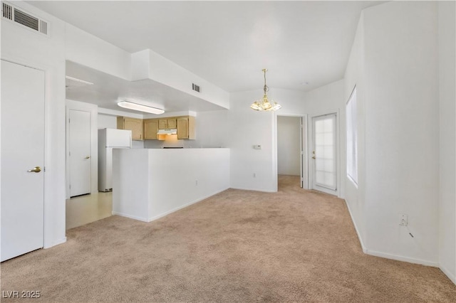 interior space with light carpet and visible vents