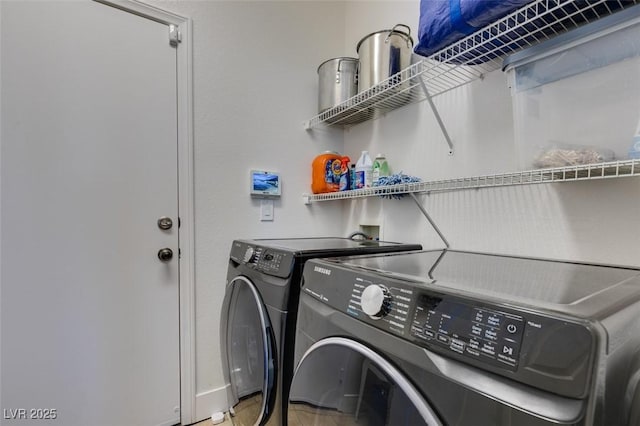 laundry room with independent washer and dryer