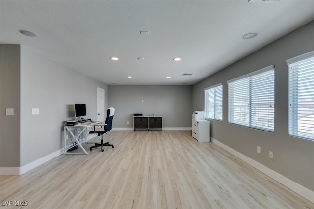 home office featuring recessed lighting, wood finished floors, visible vents, and baseboards