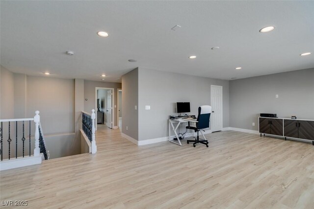 home office featuring recessed lighting, baseboards, and wood finished floors