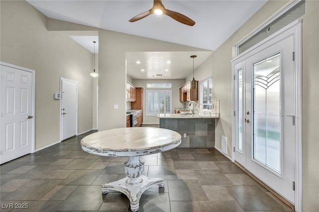 bathroom featuring recessed lighting, visible vents, vaulted ceiling, ceiling fan, and baseboards