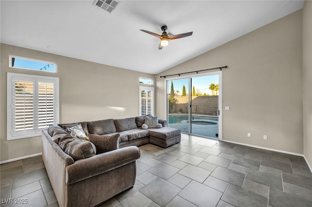 living room featuring vaulted ceiling, visible vents, plenty of natural light, and ceiling fan