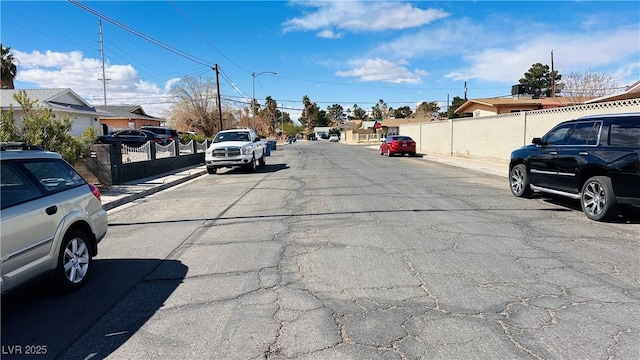 view of road featuring curbs and sidewalks