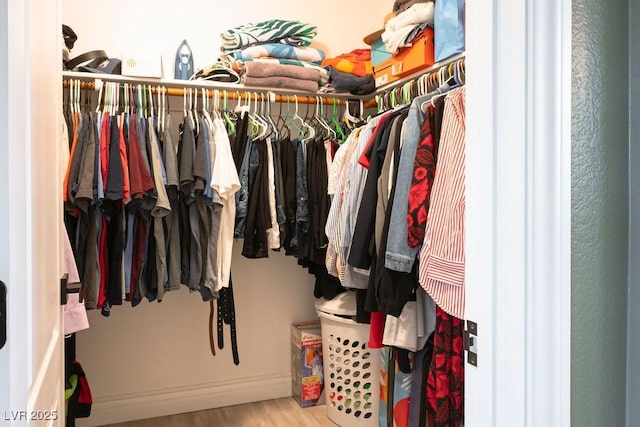 spacious closet with wood finished floors