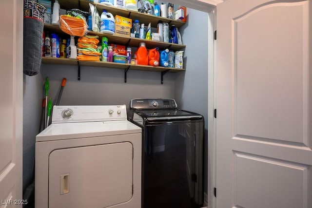 clothes washing area with laundry area and washing machine and dryer