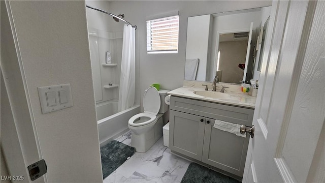 bathroom featuring toilet, marble finish floor, shower / bath combo, and vanity