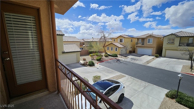 balcony featuring a residential view