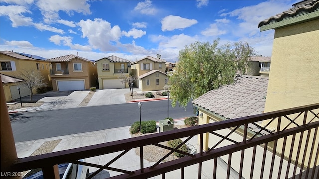 balcony featuring a residential view